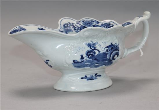A Worcester Triangular Platform pattern blue and white sauceboat, c.1755, length 19.5cm
